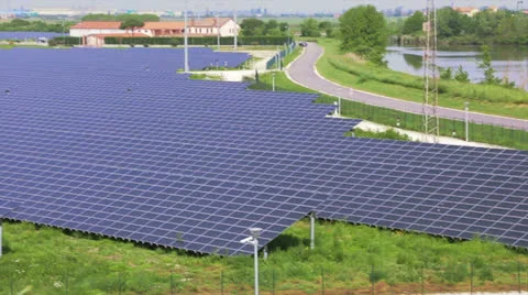 Energy solar panels on green fields Stock Footage