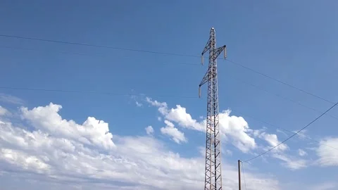 Energy tower pylon on a cloudy sky background in time lapse. pylon clouds. 스톡 동영상 206048102