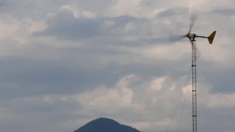 Energy Windmill and clouds Stock Footage 79277928