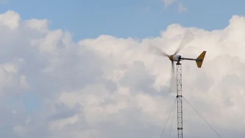 Energy Windmill and clouds Stock Footage 79283252