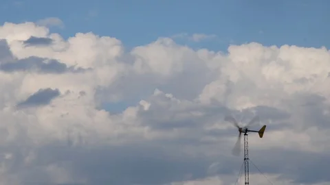 Energy Windmill and clouds Stock Footage 79283611