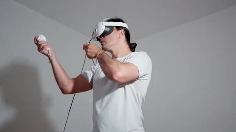 Engage in a captivating Virtual Reality Gaming Experience that immerses you in Stock-Footage 311448005