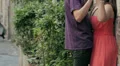 an engaged couple kissing on the wall and holding your hand - lover - love HD Footage