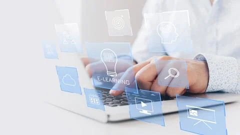 Engagement with e-learning tools on a laptop in a modern setting Stock Photos