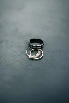 The engagement ring and the love ring are on the table. Stock Photos