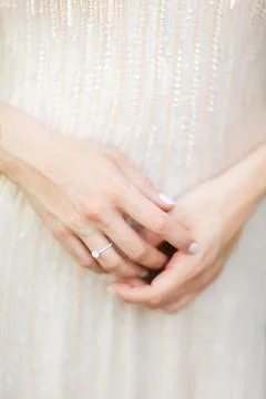 Engagement ring on bride's finger Stock Photos