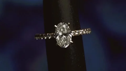 Engagement Ring With Massive Oval Diamond Solitaire Stone - Close Up Stock Footage 229038265