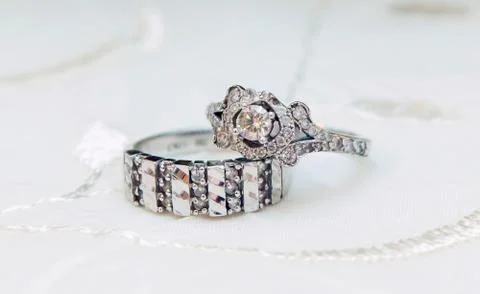 The engagement ring set . wedding ring set isolated on white . Engagement dia Stock Photos