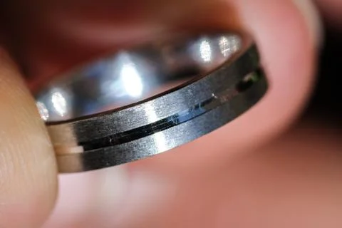 Engagement ring, silver ring in finger Stock Photos
