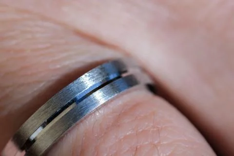 Engagement ring, silver ring in finger Stock Photos