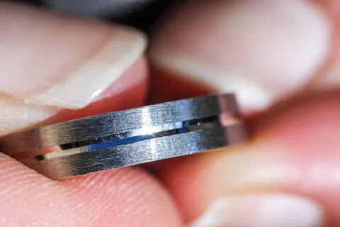 Engagement ring, silver ring in finger Stock Photos