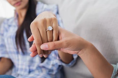 Engagement ring on womans hand Stock Photos