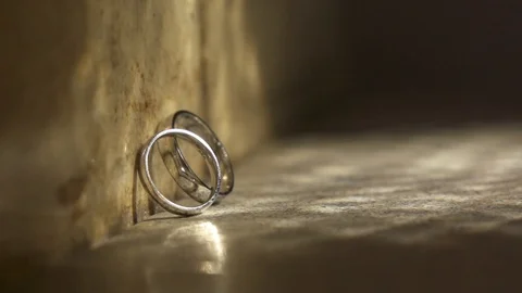 Engagement rings in light rays Stock Footage