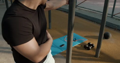 Engaging in active outdoor training sessions using various types of fitness Stock Footage 317756341