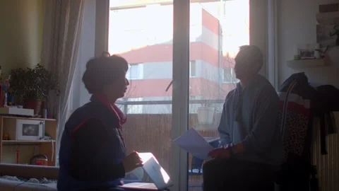 An Engaging and Meaningful Discussion Between Two Individuals in Their Home Stock Footage 311118836