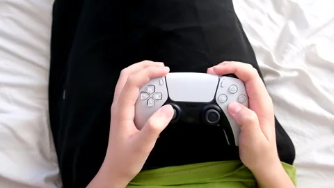 Engaging and thrilling gameplay experience that comes with  gaming controller Video stock 288506562