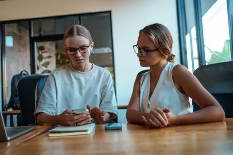 Engaging in Collaborative Discussion within a Modern and Innovative Workspace Stock Photos