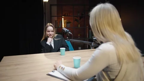 Engaging conversation in a podcast studio with female 스톡 동영상 315908770