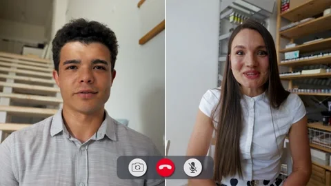 Engaging conversation on split screen call with enthusiastic friends Stock Footage 310964086