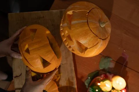 Engaging in Creative Pumpkin Carving Activities for Delightful Halloween Stock Photos