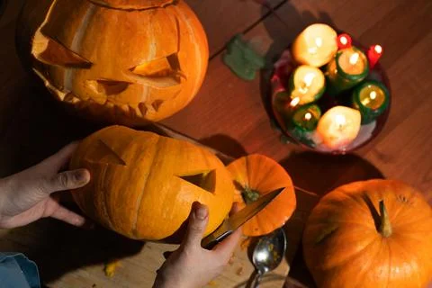 Engaging in Creative Pumpkin Carving Activities to Enhance Your Halloween Stock Photos