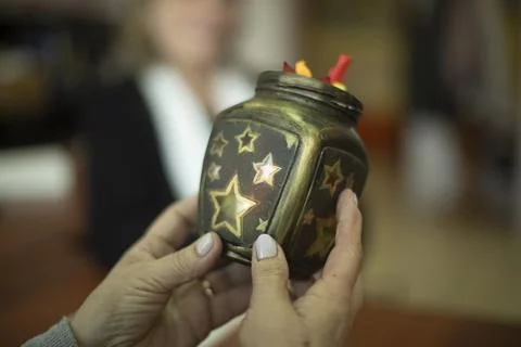 Engaging in creativity. Made with your own hands. Stars on jar. Stock Photos