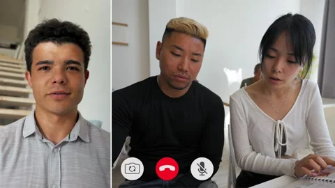 Engaging discussion during split screen online call Video stock 310963961