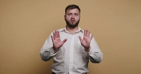 Engaging expressions of emotion captured against a bold backdrop in vibrant.. Видео 329110219