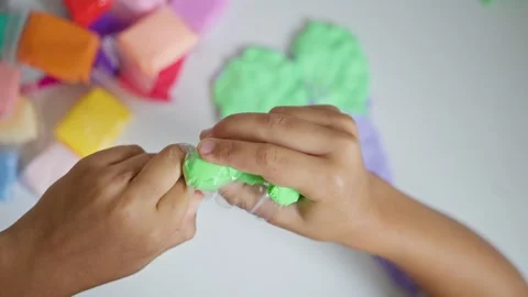 Engaging handson activity involving vibrant and colorful modeling clay that is Stock Footage 316972705