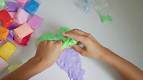 Engaging handson activity involving vibrant and colorful modeling clay that is Stock Footage 317712414