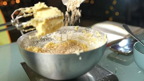 Engaging in Holiday Baking Preparation with Various Bowls Vidéo 295760003