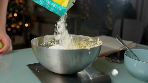 Engaging in Holiday Baking Preparation with Various Bowls Vidéo 295760032