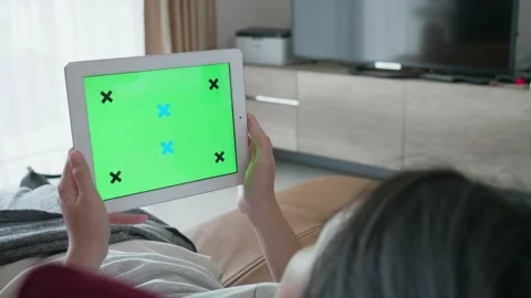 Engaging with Interactive Technology on a Tablet Stock Footage 314570637