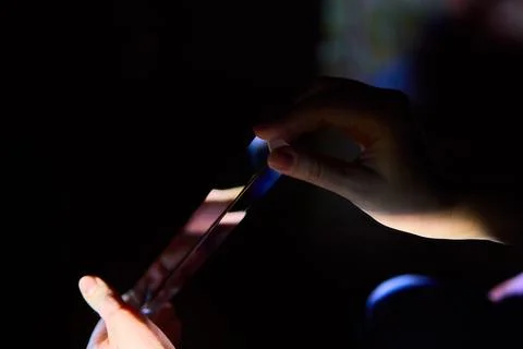 An engaging Light Refraction Experiment using a Prism and the interaction of Stock Photos