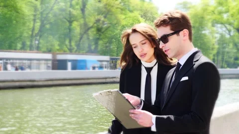Engaging in Meaningful Business Collaboration While Being Surrounded by a Scenic Stock Footage 312035959