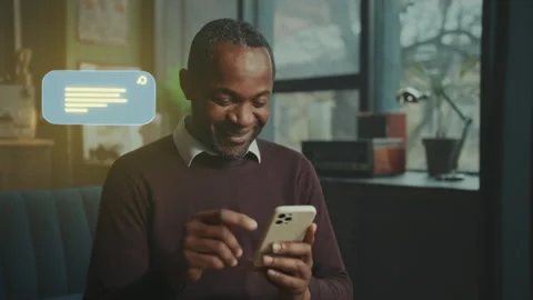 Engaging in Messaging: A Man Enjoys Text Conversations Stock Footage 319442949