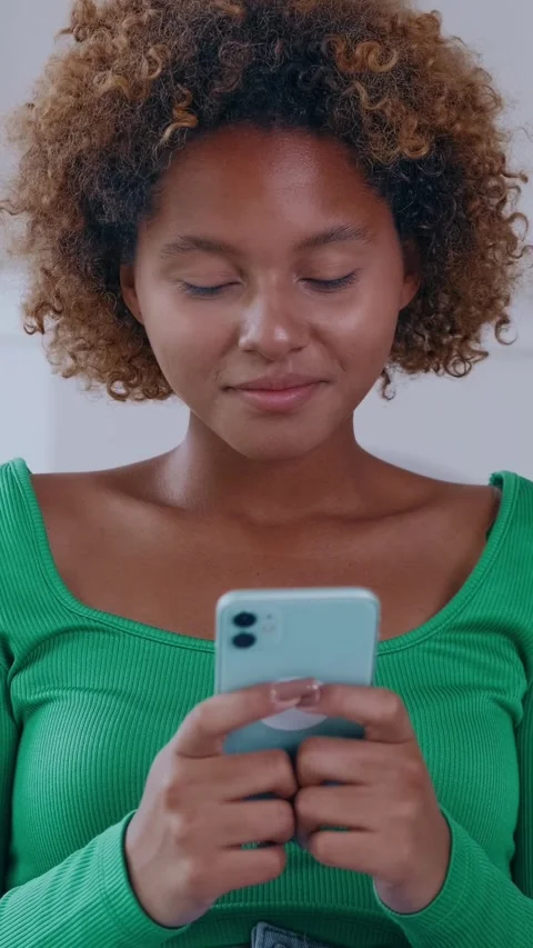 Engaging Moment of Self-Reflection While Checking Messages Indoors Stock Footage 320096832