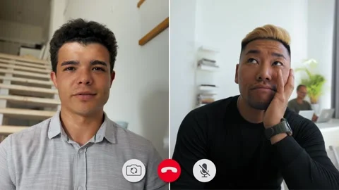 Engaging online discussion between two friends during video call Stock Footage 310963932