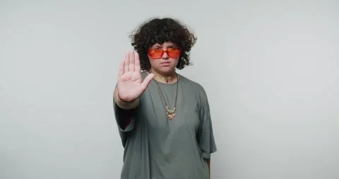 Engaging performance showcasing hand Stop gestures and vibrant expressions .. Stock Footage 316180816