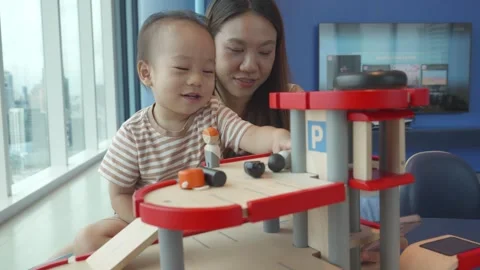 Engaging Playtime at a Modern Play Area Stock Footage 343556463