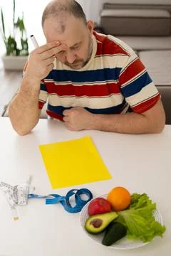 Engaging in the Process of Contemplating and Making Healthy Eating Choices .. Stock Photos