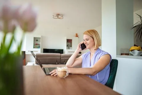 Engaging in a productive conversation at home workspace Stock Photos