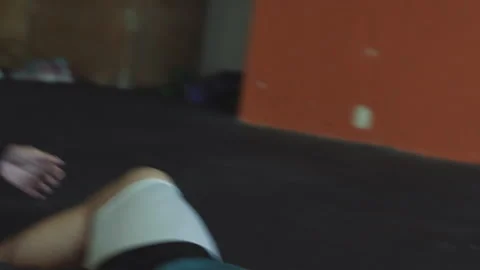 Engaging weight ball exercise routine between man and woman at gym Stock Footage 312725913