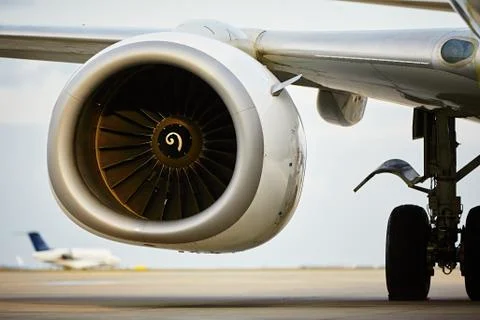 Engine of the airplane on the runway Stock Photos