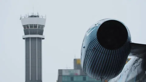 Engine of Airplane on a Snow-Covered Tarmac - airport Stock Footage 255120823