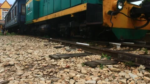 Engine and old blue train cars in the platform Stock Footage 197049816