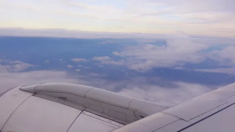The engine and part of the wing of a passenger plane seen from the window Video stock 249170088