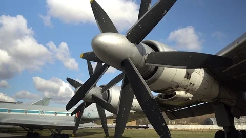 Engine and propeller of the old retro transport plane. Fragment of the aircraft. Stock Footage 74467037