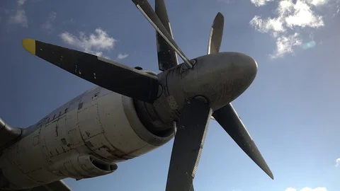 Engine and propeller of the old retro transport plane. Fragment of the aircraft. Video stock 74477249