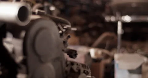 Engine and retro car in garage Stock Footage 221107096